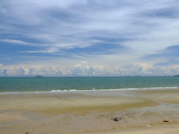 Scenic view of beach against sky