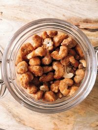 High angle view of dessert in jar on table