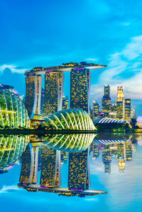 Singapore skylines downtown and financial district buildings reflection along at twilight time