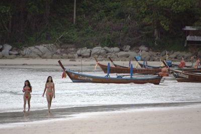 Woman standing on beach