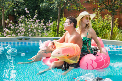 Woman in a high angle view of swimming pool