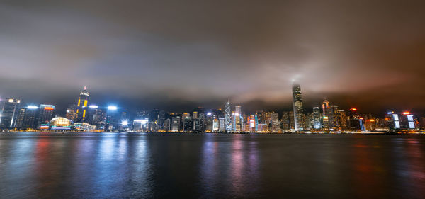 Illuminated city buildings at night