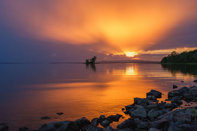 Scenic view of sea against sky during sunset