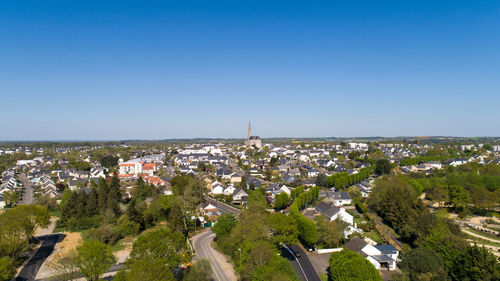 High angle shot of townscape against clear sky