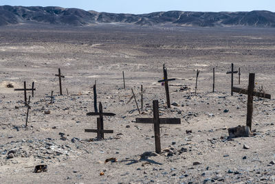 Scenic view of cross on land