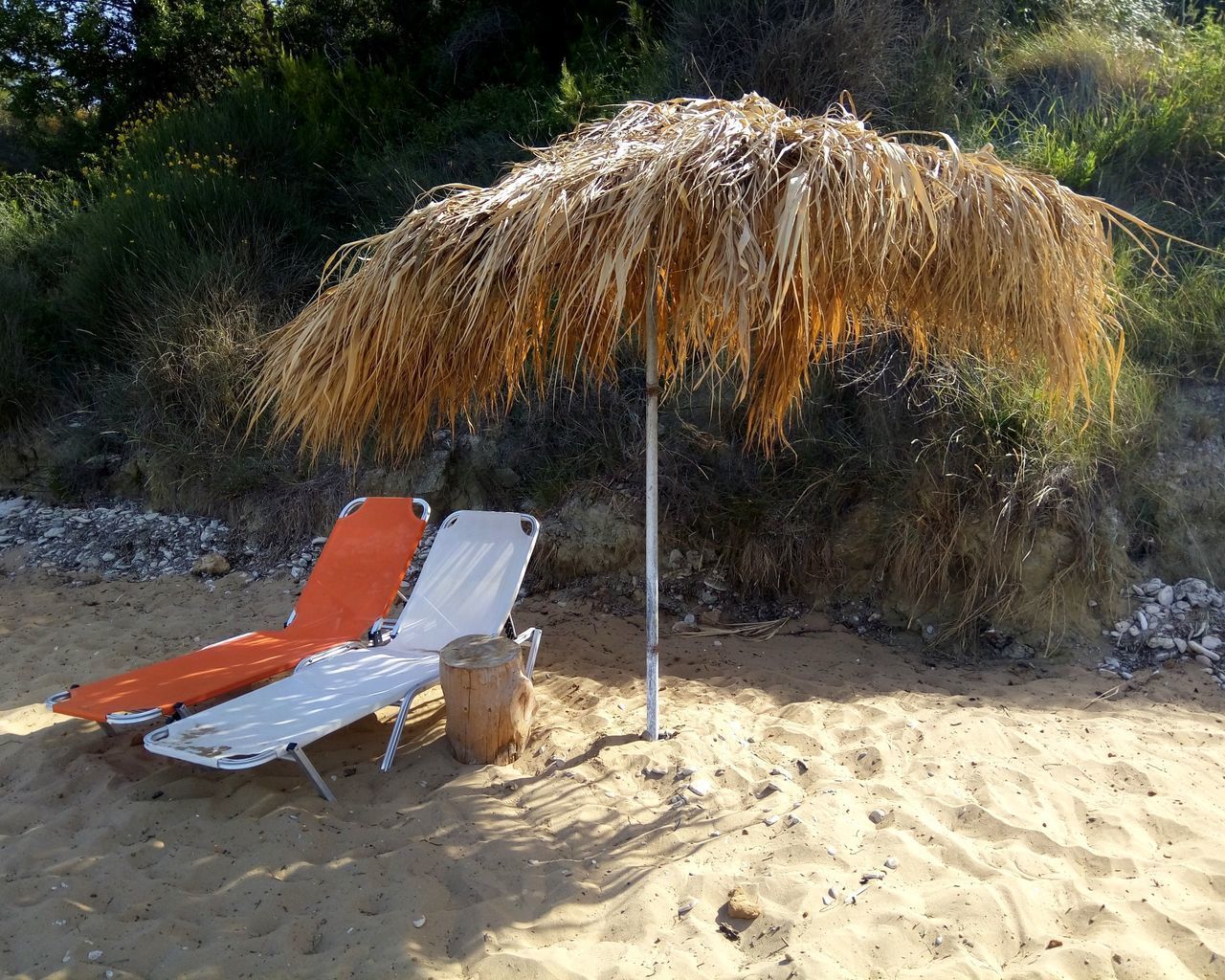 LOUNGE CHAIRS ON SAND