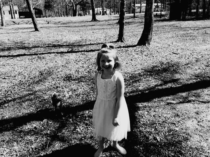 tree, one person, girls, childhood, child, plant, nature, real people, day, land, portrait, sunlight, females, looking at camera, leisure activity, field, standing, lifestyles, outdoors, innocence