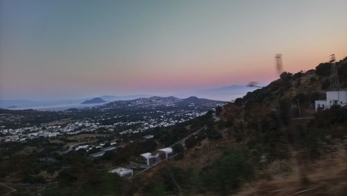 Panoramic view of buildings against sky during sunset