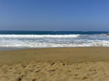 Scenic view of sea against clear sky