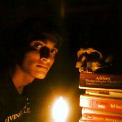 Portrait of woman in dark room