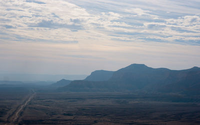 View of landscape against cloudy sky