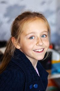 Close-up portrait of a smiling girl