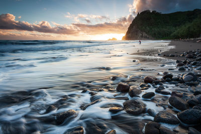 Scenic view of sea against sky during sunset