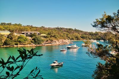 Scenic view of sea against clear blue sky