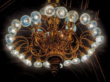 Low angle view of illuminated chandelier