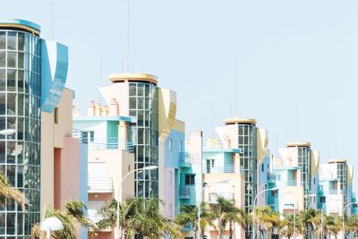 Low angle view of buildings against clear sky