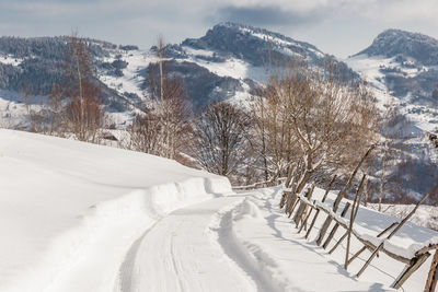 Snow covered mountain against sky