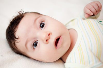 Cute baby boy on bed