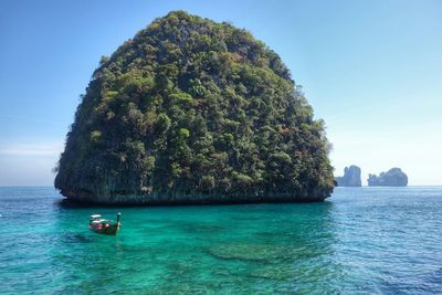 Scenic view of sea against blue sky