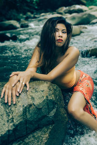 Portrait of young woman on beach