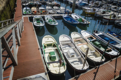 High angle view of boats moored in marina