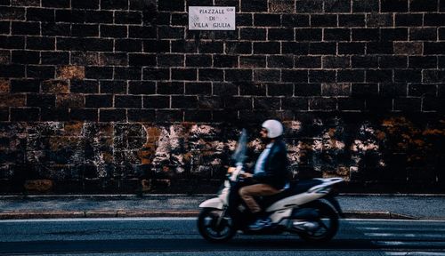 Man cycling on road