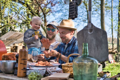 Man holding food on outdoors