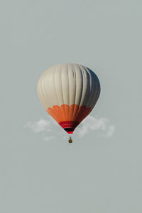 Low angle view of hot air balloon flying in sky