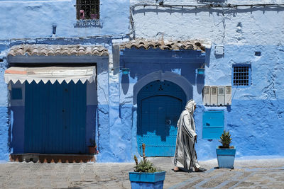 Statue against building