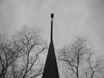 Low angle view of silhouette tree against sky