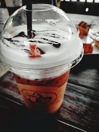 Close-up of ice cream in glass on table