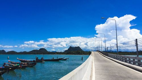 Panoramic view of boats in blue sea against sky