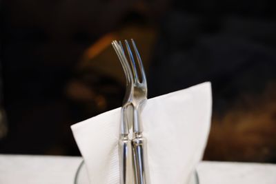 Close-up of white wine on table