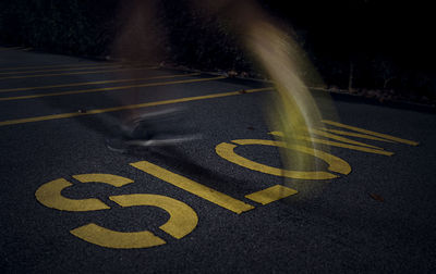 Road sign on street in city