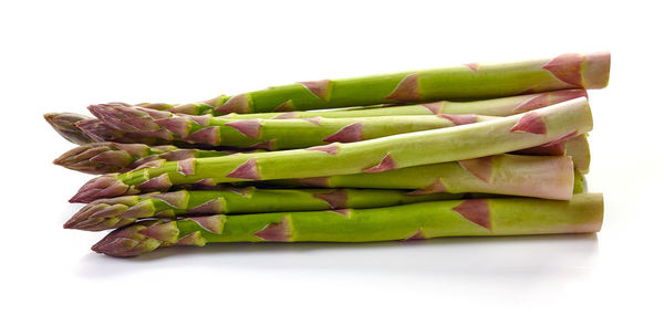 Close-up of chopped vegetables against white background