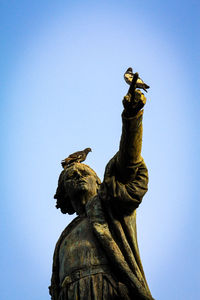 Low angle view of statue against clear sky