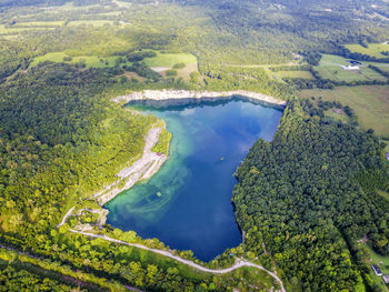 High angle view of lake amidst trees