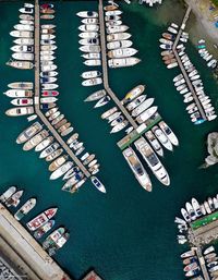 Aerial view of boats moored at harbor