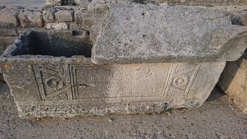 Close-up of text on stone wall