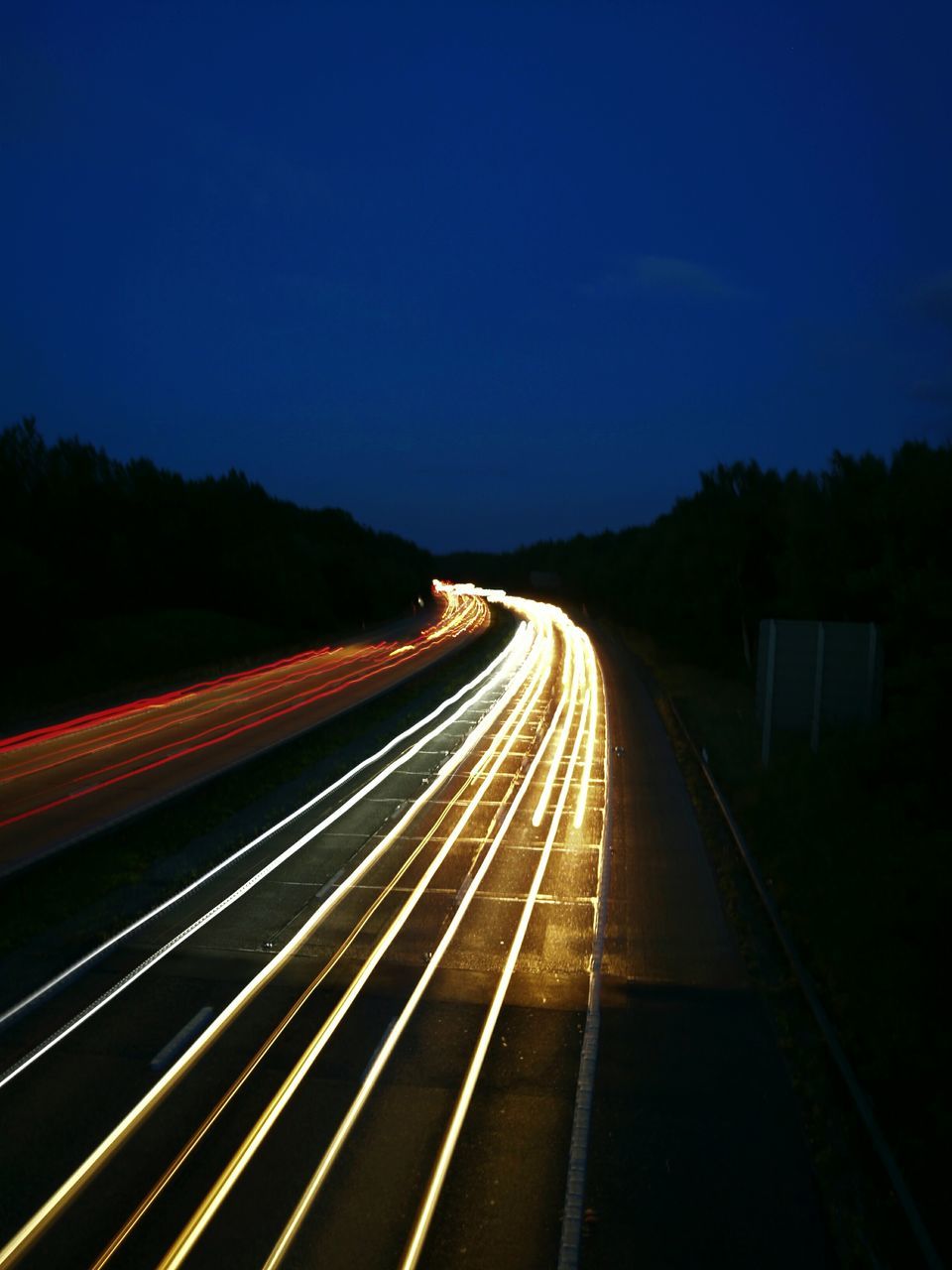 speed, night, transportation, light trail, long exposure, illuminated, motion, road, no people, outdoors, the way forward, clear sky, sky, nature