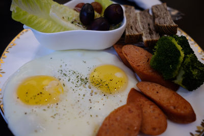 Close-up of breakfast served on plate