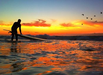 Scenic view of sea during sunset