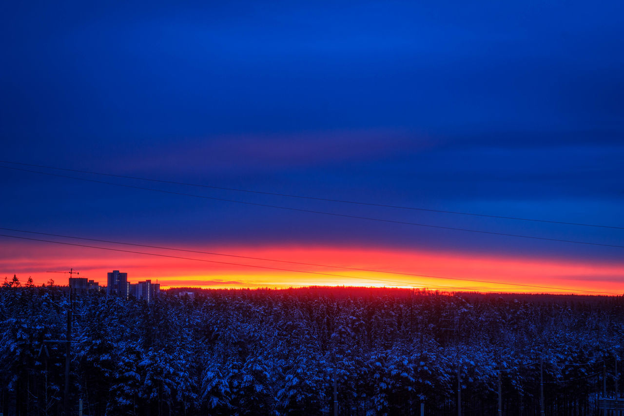 SCENIC VIEW OF SUNSET OVER LANDSCAPE