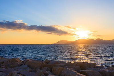 Scenic view of sea against sky during sunset