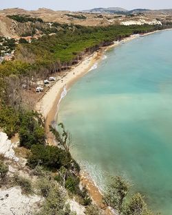 High angle view of bay against clear sky