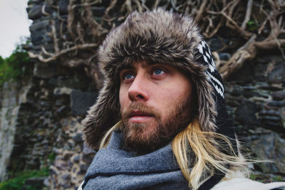 Close-up of bearded man in warm clothes