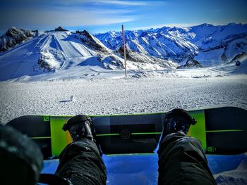 Scenic view of snow covered mountains