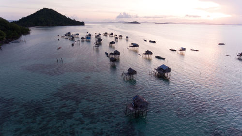 High angle view of sea against sky during sunset