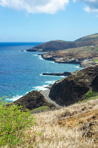 Scenic view of bay against sky