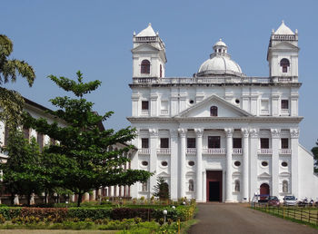 Facade of historic building against clear sky